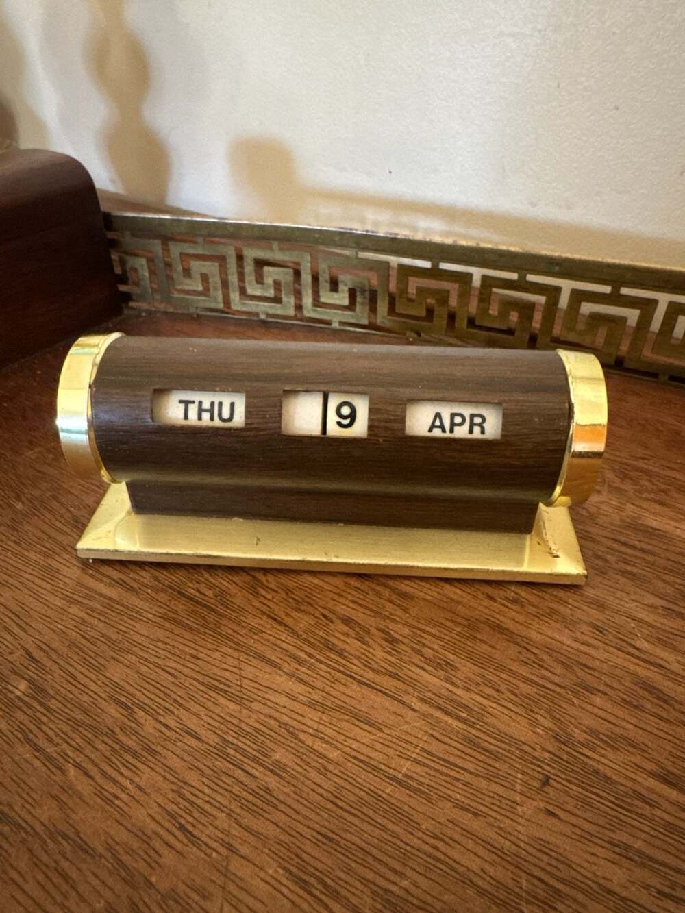 Vintage Mid Century Brass and Faux Wood Cylindrical Perpetual Desk Calendar